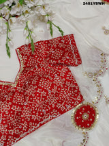 White chinon silk saree with red cutdana mirror work and white beads