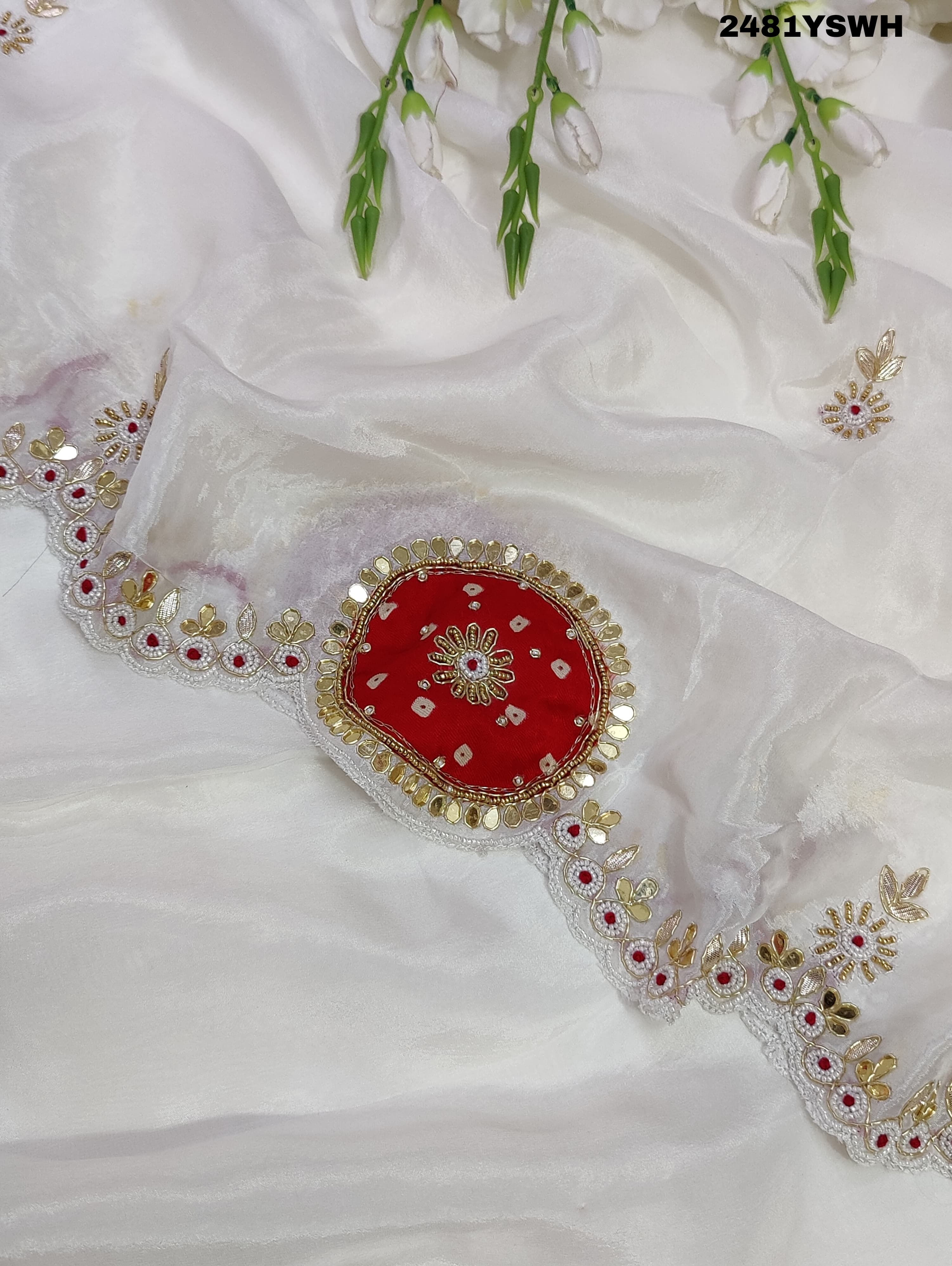White chinon silk saree with red cutdana mirror work and white beads