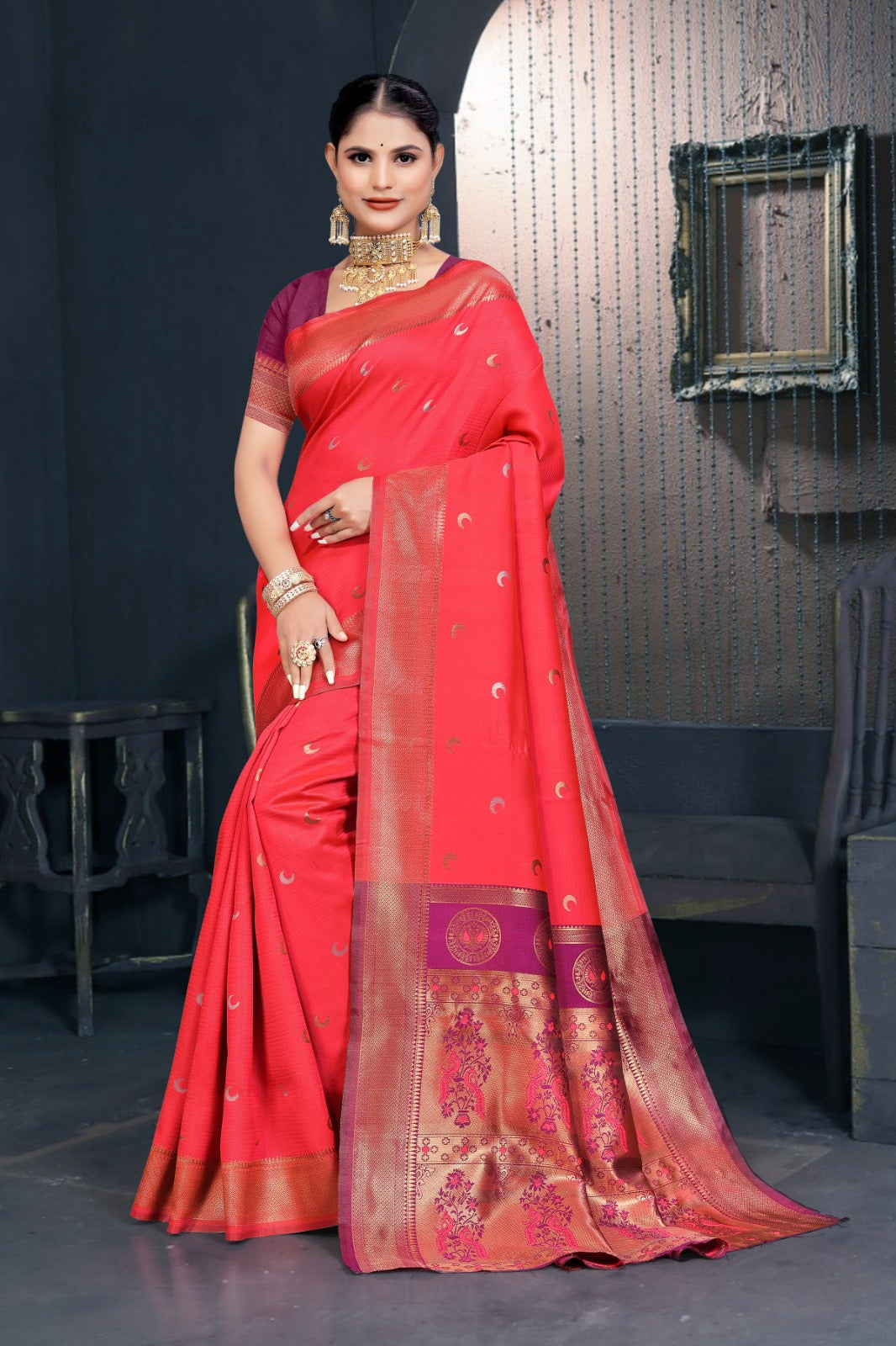 A red and pink Banarasi Dola silk saree with zari print, suitable for festive wear.