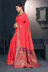 A red and pink Banarasi Dola silk saree with zari print, suitable for festive wear.