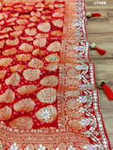 Neemzari Bandhej saree in traditional red color