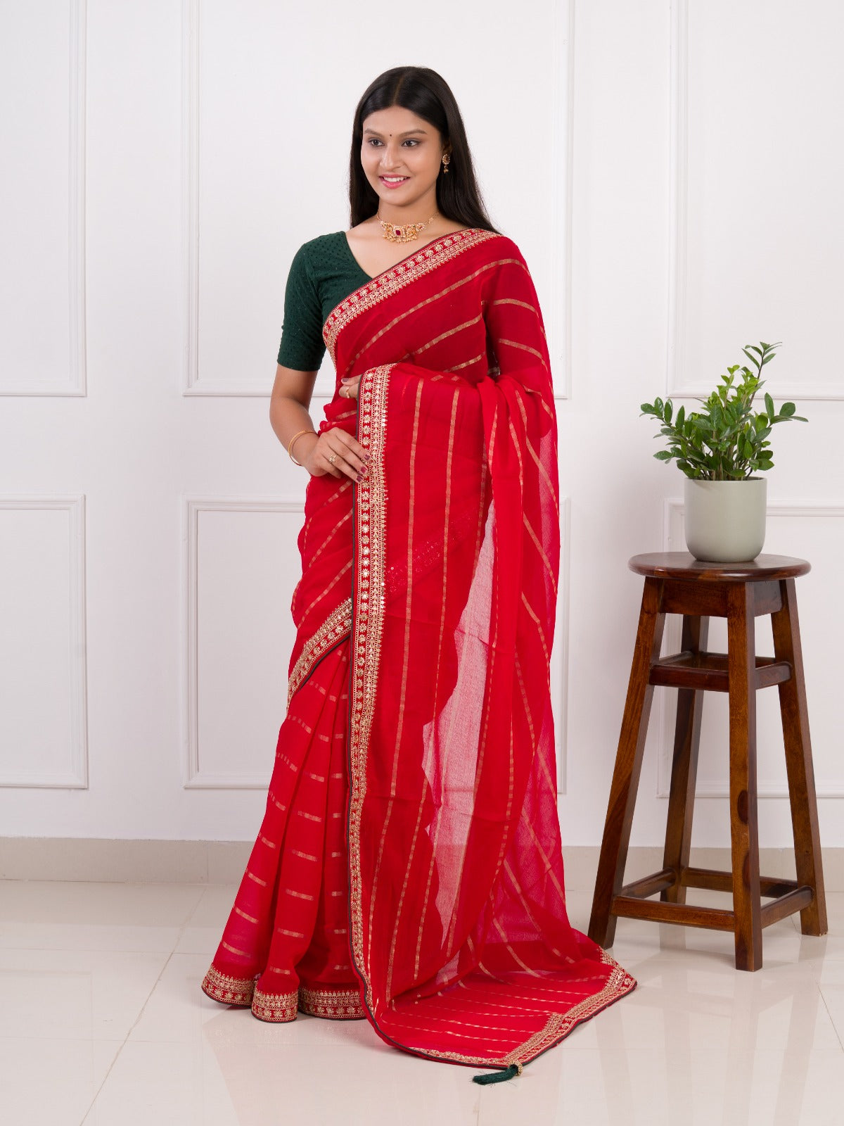 Red saree with gold border