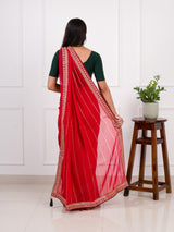 Red saree with gold border