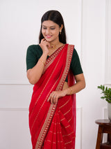 Red saree with gold border