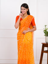 orange saree with a white printChiffon Bandhani style With Vintage Work Saree
