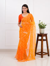 orange saree with a white printChiffon Bandhani style With Vintage Work Saree