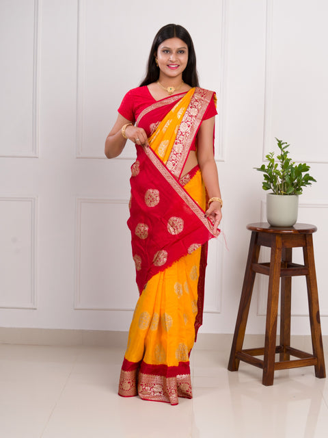A yellow and red saree with  Pure Georgette Zari Faag Shadded Saree