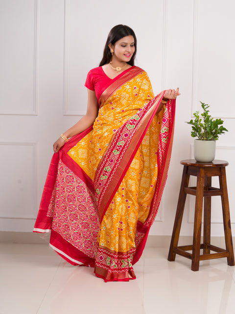  A yellow and red pashmina cotton silk saree with a patola style pattern 