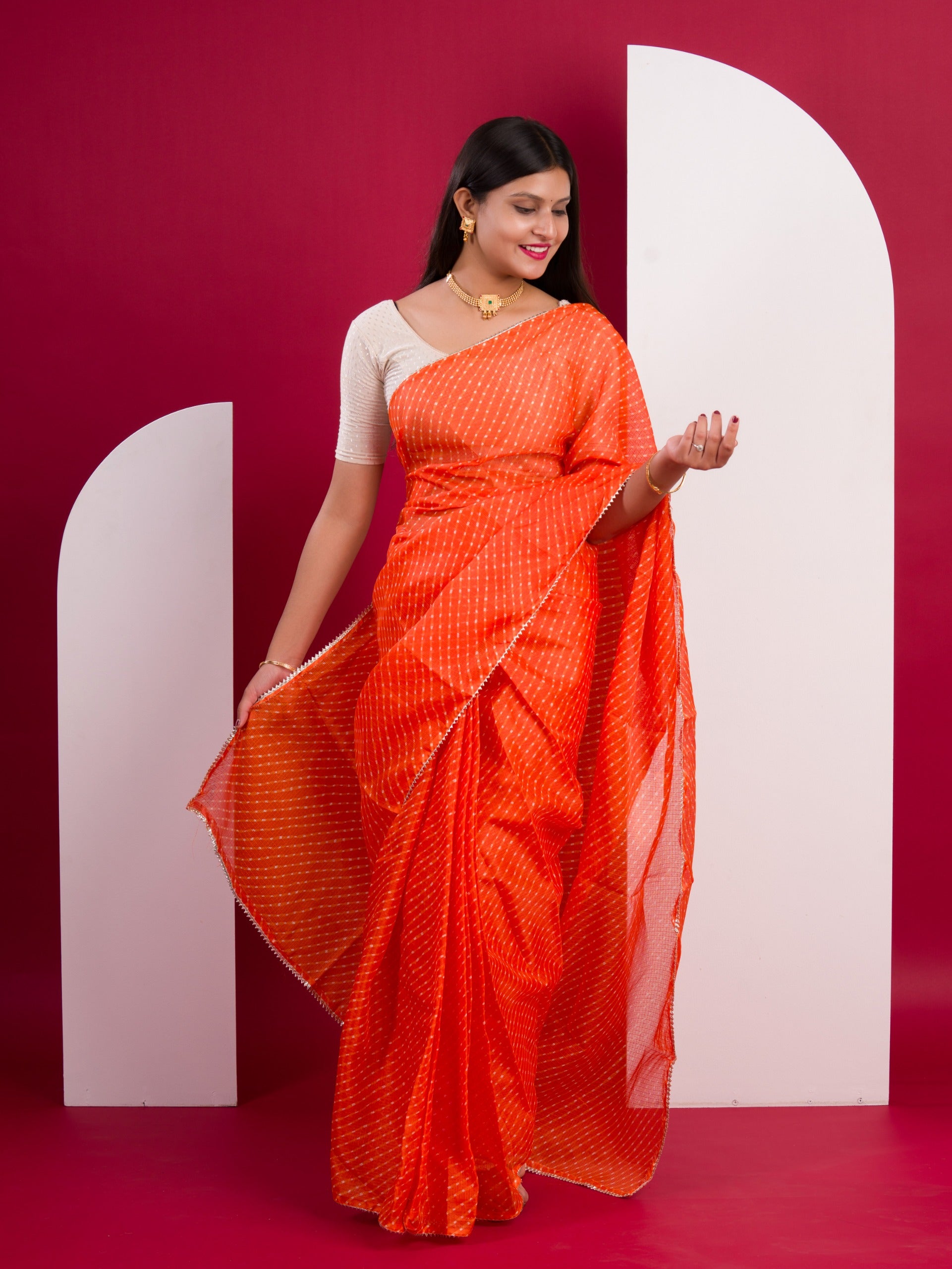 Kota Doria Saree in orange colour under 1000