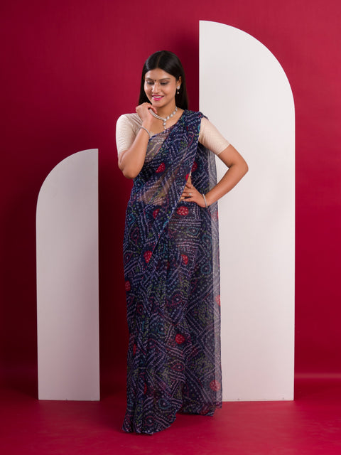 A blue colour geometric patterned saree with bandhani style dots under 500
