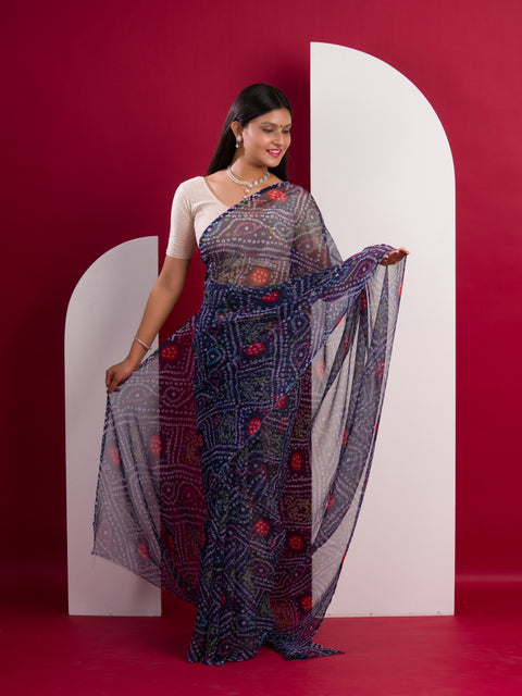 A blue colour geometric patterned saree with bandhani style dots under 500