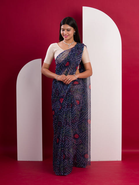 A blue colour geometric patterned saree with bandhani style dots under 500
