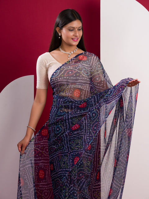 A blue colour geometric patterned saree with bandhani style dots under 500