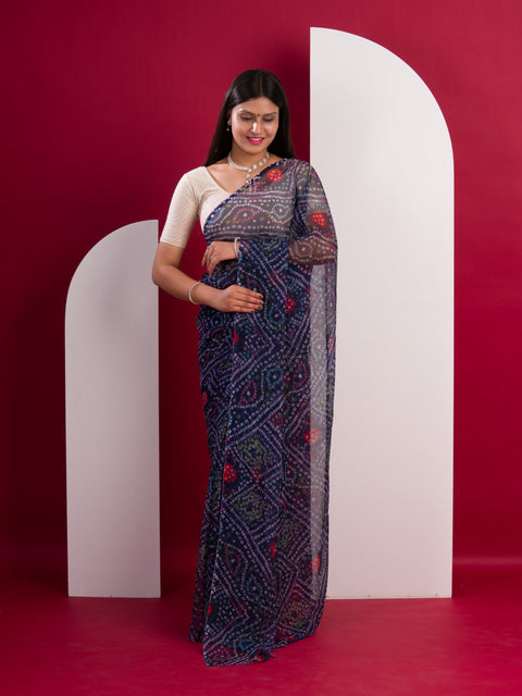 A blue colour geometric patterned saree with bandhani style dots under 500
