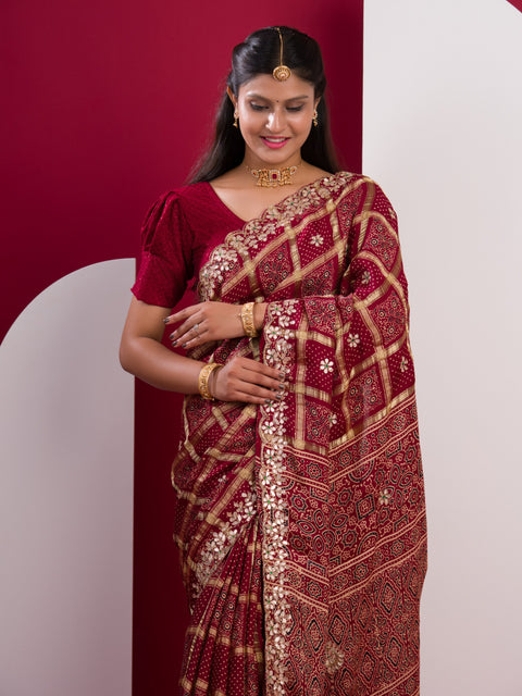 KcPc Pure Modal Gaji Silk Bandhani Ajrakh Handblock with Gotapatti Handwork Saree AMT