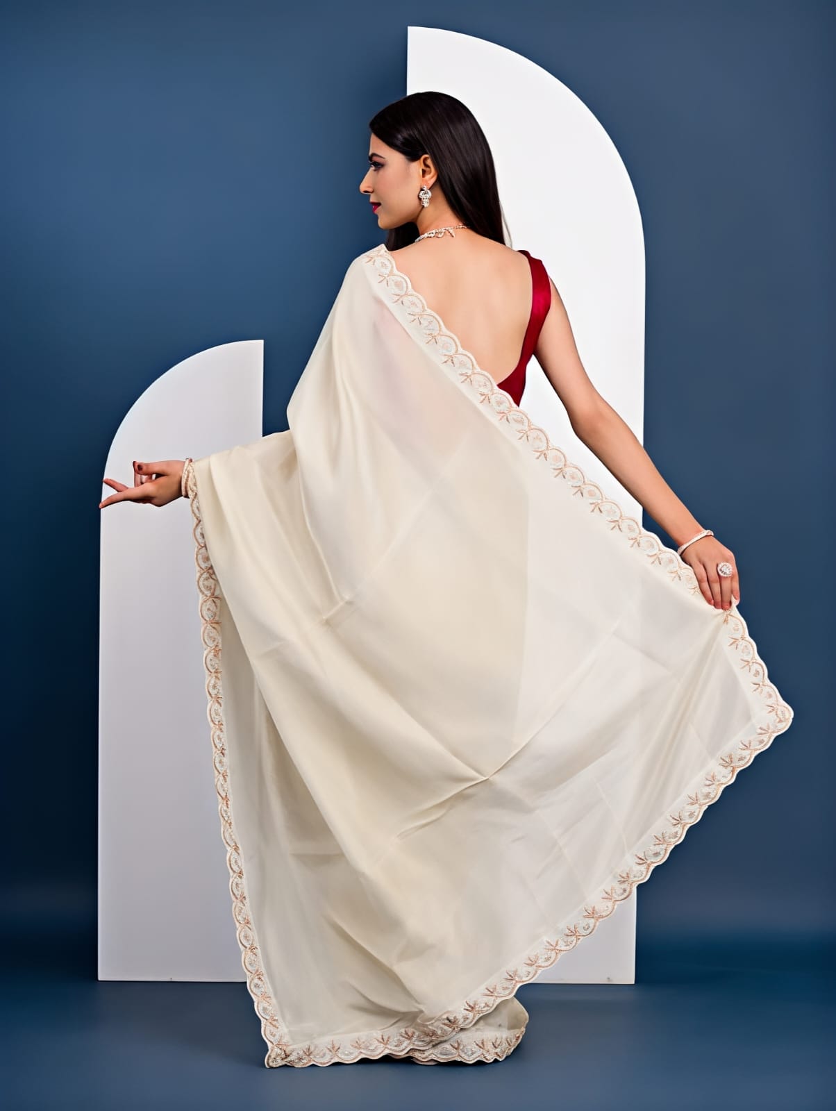 off white colour saree in red colour blouse 