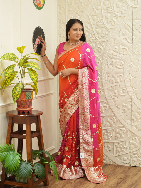 A pink and orange saree with Gota Patti Work