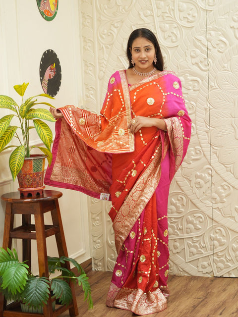 A pink and orange saree with Gota Patti Work