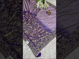 A purple Banarasi style saree with sequence embroidery work 