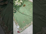 A green saree with tissue silk texture and Gotapatti work embroidery.