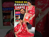 Woman in a red saree with gold borderTissue silk Banarasi Style 