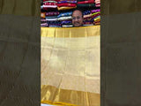 A yellow and gold tissue silk saree with Banarasi zari border