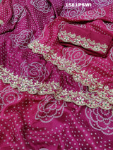A pink and purple bandhani style Dola Silk saree with gotapatti handwork