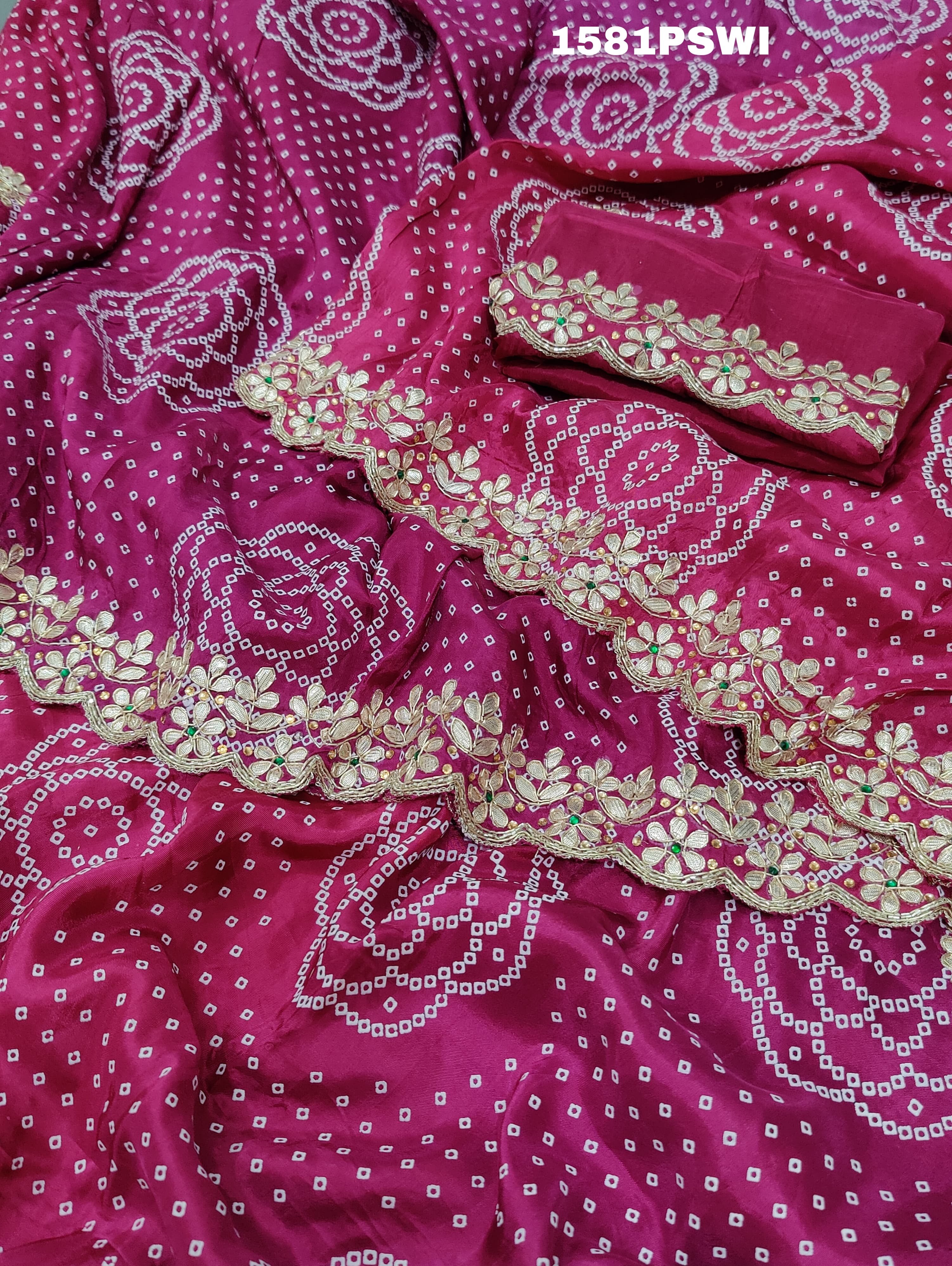 A pink and purple bandhani style Dola Silk saree with gotapatti handwork