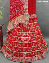 A red and multicolor traditional Gaji silk lehenga with zardozi work