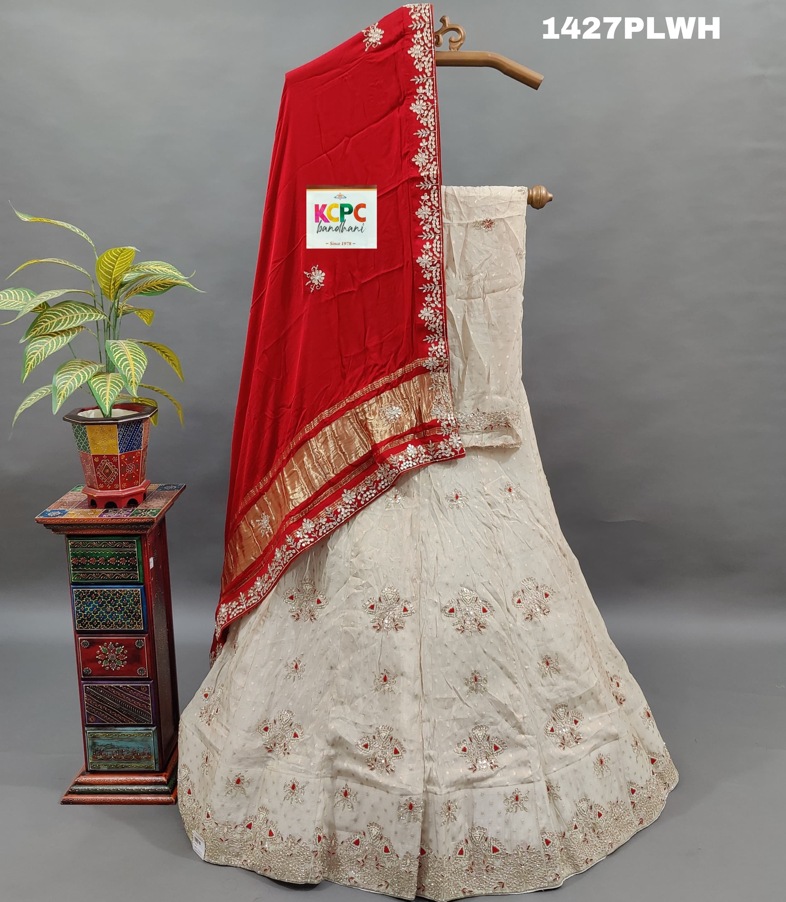 A pure upada silk lehenga with red Gaji silk dupatta