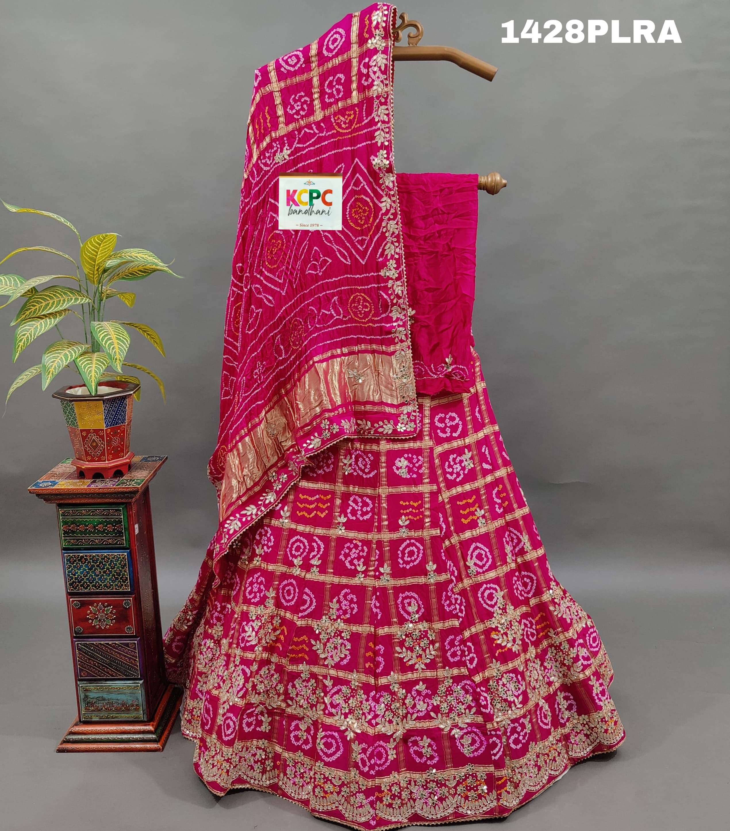 A pink pure Gaji silk lehenga with Gota Patti work