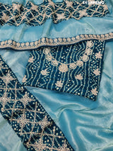Ablue banarsi handloom bandhani saree with zari thread border and gota patti work, 