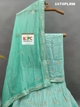A green H O silk double shade heavy cutdana mirror work lehenga 